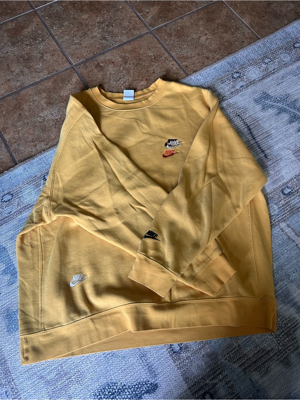 Nike Men’s Mustard Yellow Crewneck with Multi Swoosh Embroidery